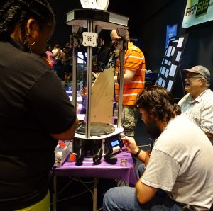 Photo of Ray, Sean, and a 3D printer at Maker Faire 2014 by Kalyan Mysore